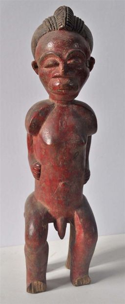null Statuette in carved wood, seated man. BAOULE. Ht. 30 cm