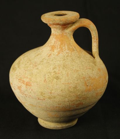 Jug in red clay with limestone deposit with...