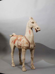 null 
Polychrome terracotta horse represented at a standstill, standing with all...