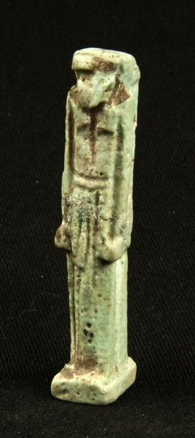 null Amulet in frit representing Horus. Egypt, XXVI-XXX dynasty. 5cm