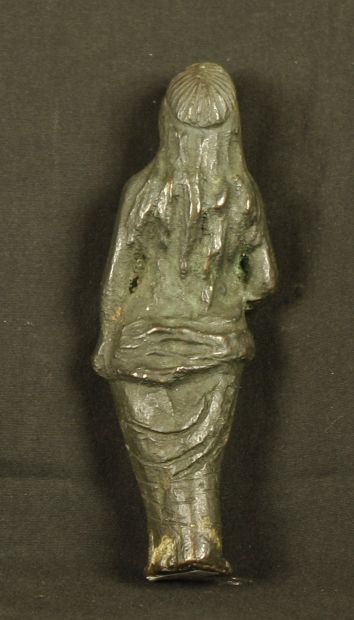 null Bronze statuette representing Venus anadyomene standing naked; she wears with...