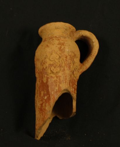 null Upper part of a sigillated drinking horn, decorated with a bacchic face surrounded...