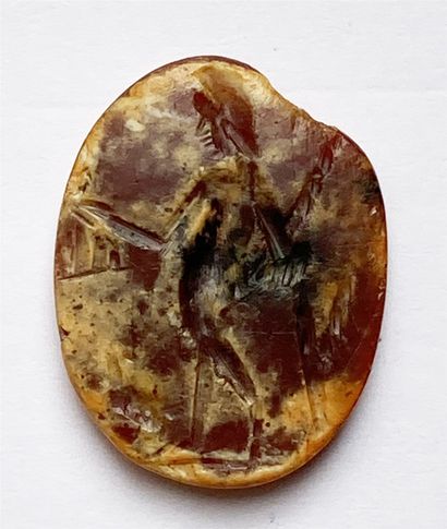 null Carnelian intaglio engraved with Ganymede and an eagle at his feet. Roman art,...
