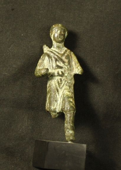 Bronze statuette with green and brown patina...