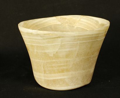 Translucent veined alabaster bowl of truncated...