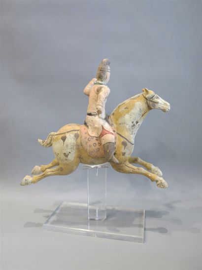 null 
Polo player riding his horse, depicted as a jumping figure in terracotta with...