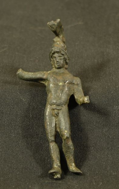 null Bronze statuette of the god Mars represented naked with a well marked musculature,...