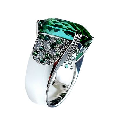  Ring in white gold palladium of 20 gr with a main stone a mint green tourmaline...