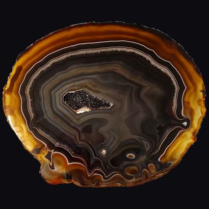 null Agate slice composed of a magnificent bluish decoration in its center and orange...