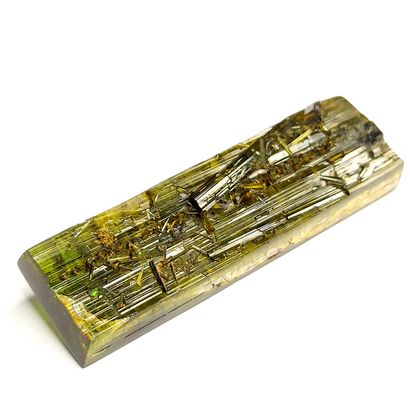 TOURMALINE - 87.90 carats Tourmaline in rough crystal form with prismatic verdelite...