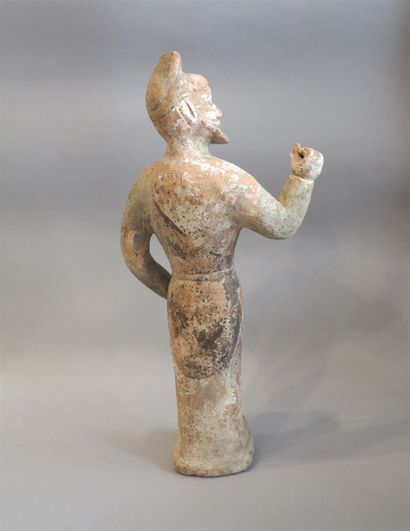 null Caravaneer in polychrome terracotta with his arm raised, camped in full action,...