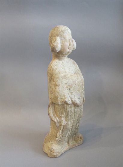 null Fat Lady in polychrome terracotta represented standing on a small terrace with...