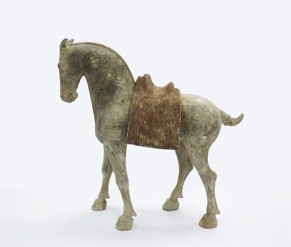 null Horse shown at a standstill with all four legs on the ground. Removable saddle....