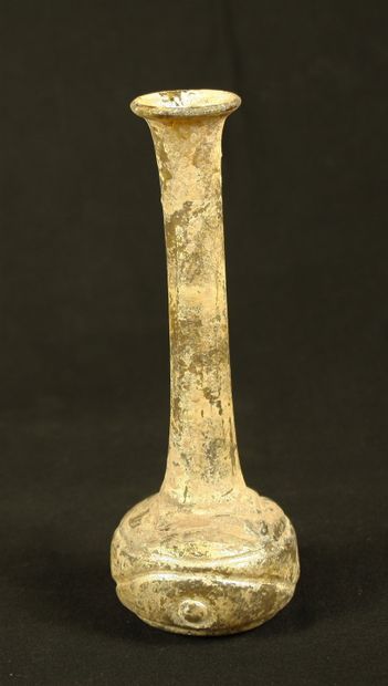 null Unguantorium out of glass with very high collar and body decorated with points...