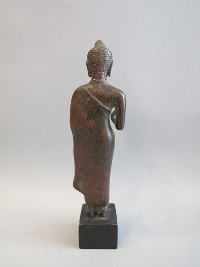 null Buddha represented standing in Vitarka Mudra the thumb forms with the index...