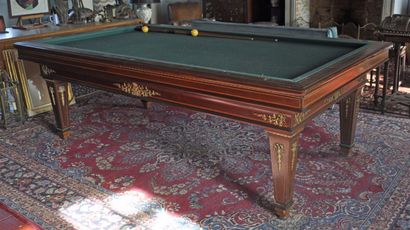 null E. BRIOTET in Paris. Pool table in rosewood inlaid with nets on tapered legs....
