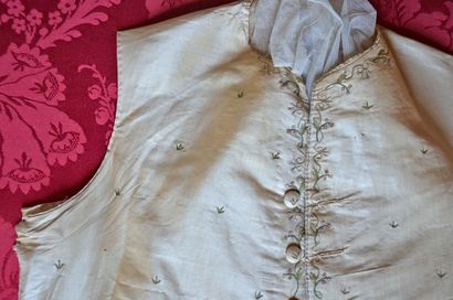null Embroidered vest in cream silk, 18th century in a frame forming a window with...