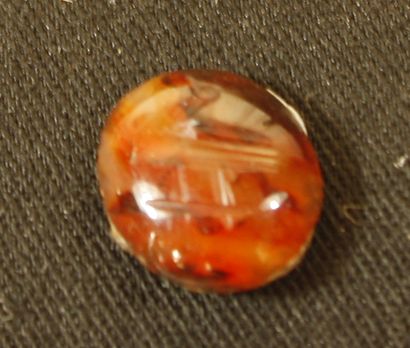 null Carnelian intaglio engraved with a bird.
Roman period, 2nd-3rd century L :1...