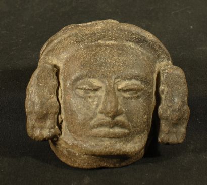 Head of a shaman in grey terracotta with...