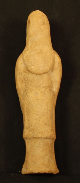 null Male terracotta statuette wearing a garment with wide sleeves, hands joined...