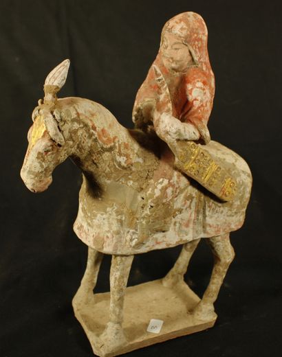 null Archer rider in polychrome terra cotta 
China, Northern Qi dynasty : 550-577...