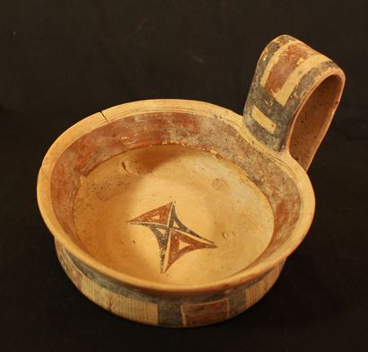 Large terracotta bowl with a cylindrical...
