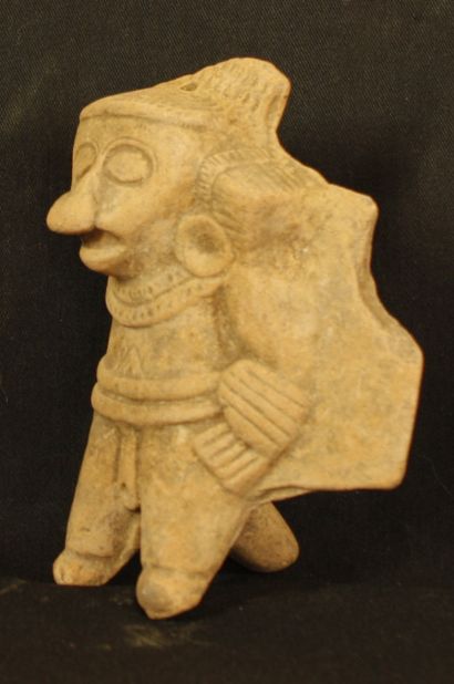null Sifflet en terre cuire en forme d’un personnage 
Veracruz classique 500ap-900ap.J.C....