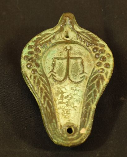 null Lot including a terracotta oil lamp painted in green imitation of bronze decorated...