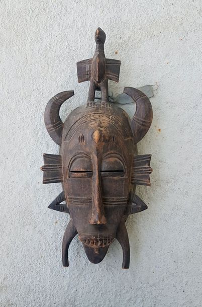 null Masque africain Senufo surmonté d'un oiseau

41 cm