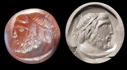 null Intaille gravée d'un profil de Jupiter.Cornaline.
Art romain.I-IIès.L:15mm.