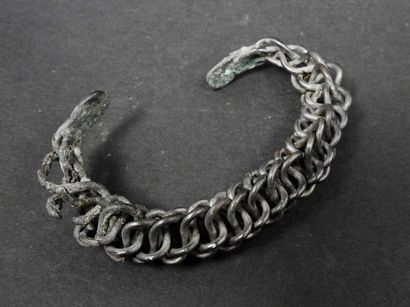 null Bracelet in twisted silver plated bronze wire ending in palmettes. good conservation...