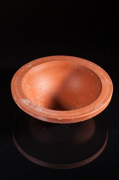 null Two orange terracotta cups, Roman period from the first century AD.