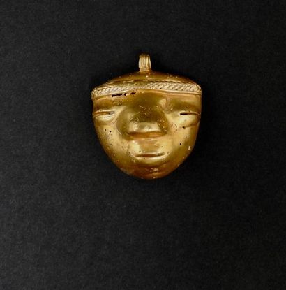 null Talismanic amulet.
Mask.Tairona Culture.
Weight approx 9,5g. Tumbaga.
L:approx....