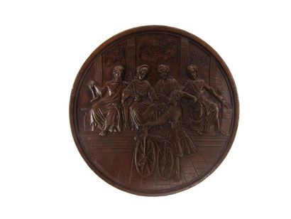 null Rare round bronze medal on the velocipede:a) obverse; presentation by a child...