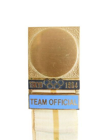 null Badge officiel en bronze doré dans son étui d'origine
60 x 36 mm