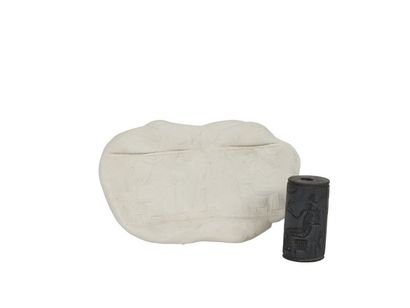 null Sceau-cylindre gravé d'une scène religieuse sur pierre brune
Mésopotamie, Période...