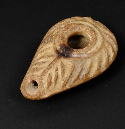 Oil lamp. Terracotta. Crusader period.

Probably...