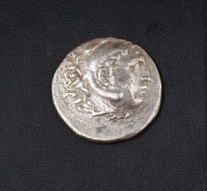 null Représentation d’une monnaie d’Alexandre III le Grand coiffé des cornes d’A...