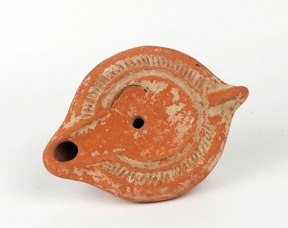 null Lamp with channel and geometrical decoration

Terracotta 12 cm

Roman Perio...