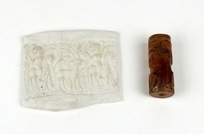 null Engraved cylinder seal of a deer hunting scene

Agate 3,9 cm