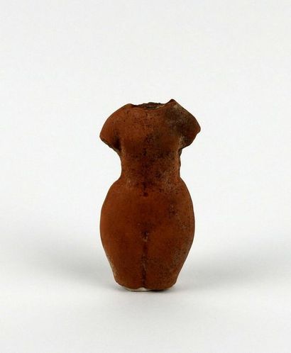 null Statuette representing a naked woman with large hips, wearing a braid

Terracotta...