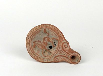 null Channel oil lamp with horse decoration

Terracotta 9 cm

Roman period 1st century...