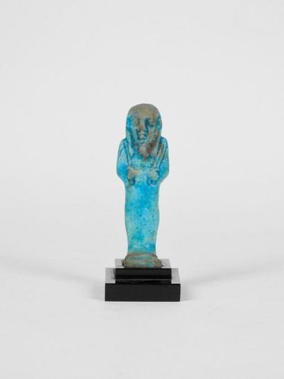 null Oushebti anepigraph in blue frit. Ptolemaic period. 332 -30 B.C.
H 8 cm
Provenance:...