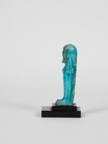 null Oushebti anepigraph in blue frit. Ptolemaic period. 332 -30 B.C.
H 8 cm
Provenance:...