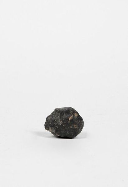 null Morceau de météorite chondrite L4 NWA 869.
Trouvé au Maroc en 2000. 43 g.
L...