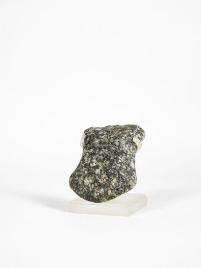 null Axe in the shape of a pure idol reminiscent of valdivia axes. Granodiorite....
