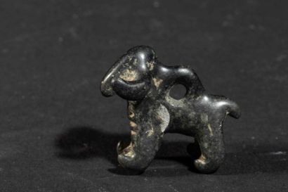 null Amulet. Horned ungulate. Likely a ram.
Silver.
I° millennium B.C.
L about 2...