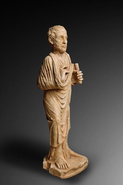 Draped standing figure, he was holding a...