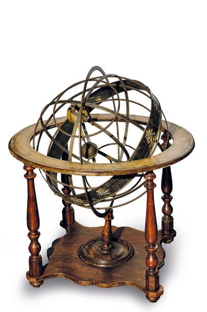 null Armillary sphere in iron, brass and paper in a walnut frame composed of four...