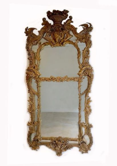 Important carved wooden bird mirror decorated...